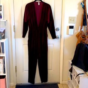 Maroon velvet plunge neck jumpsuit with pockets